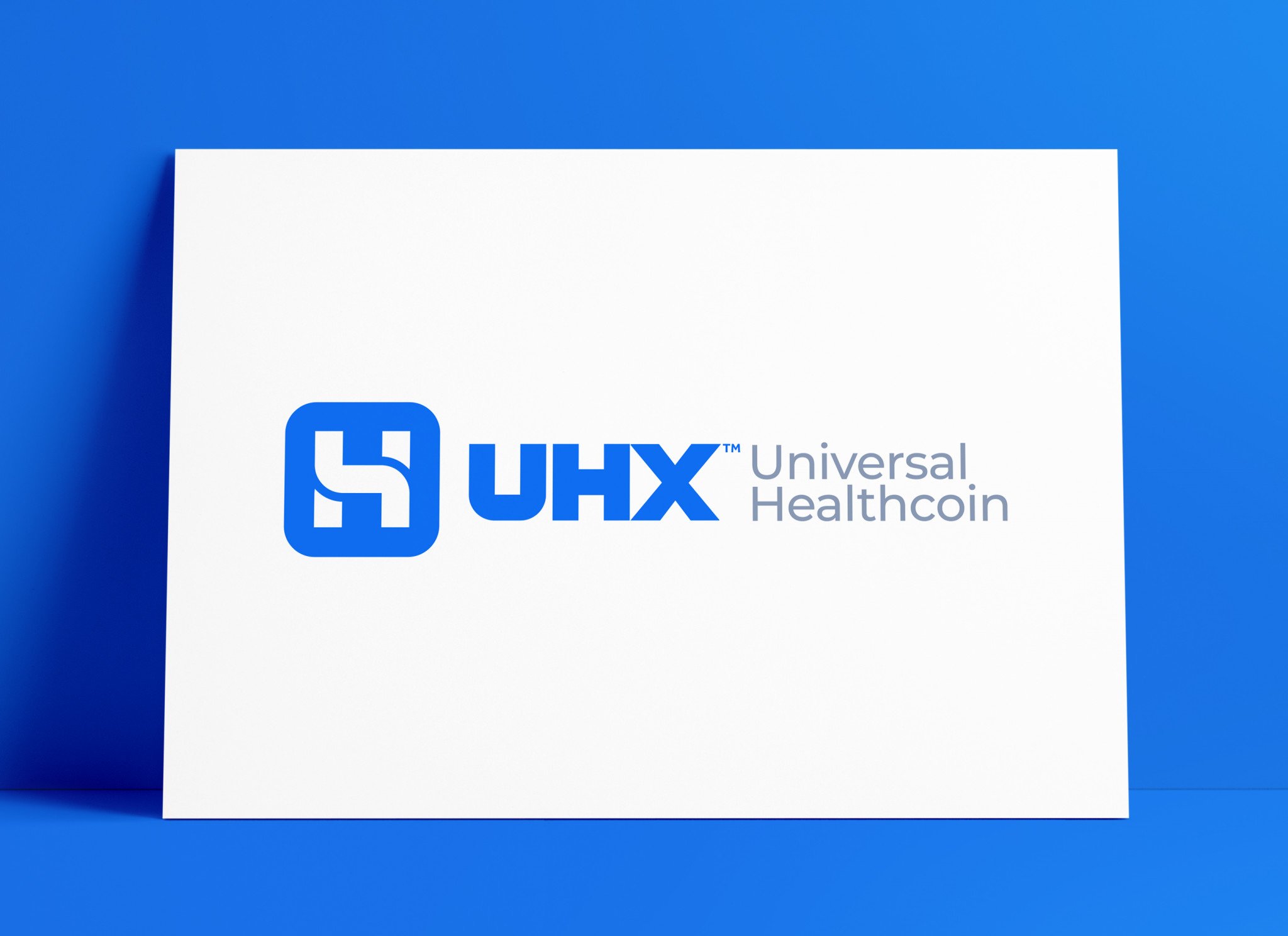 UHX Universal Health Coin Logo MockUp Poster The Logo Smith